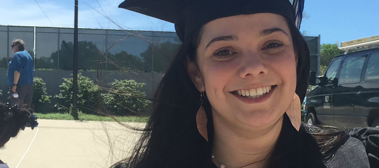 Molly Rissien in a cap and gown.