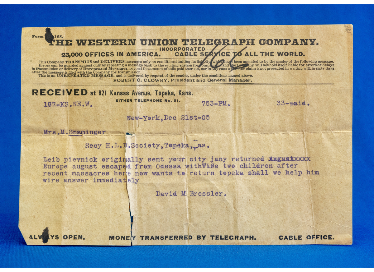 manilla telegraph with black text identifying the western union telegraph company, and blue text addressed to Mrs M Snaminger 