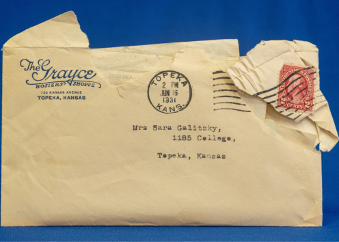 manilla envelope with a frayed edge, postmarked and addressed to Mrs Sara Galitzky, 1185 Collage, Topeka, Kansas